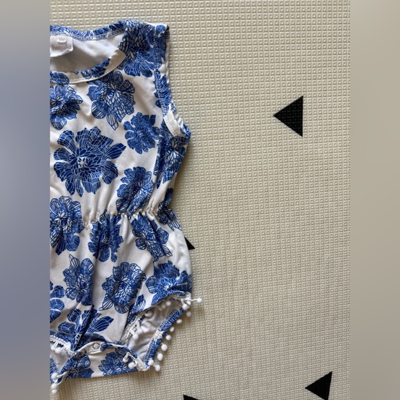 Boutique|Boho Baby girl Blue & white Floral sleeveless Romper with Pom Pom hem• - Picture 1 of 5